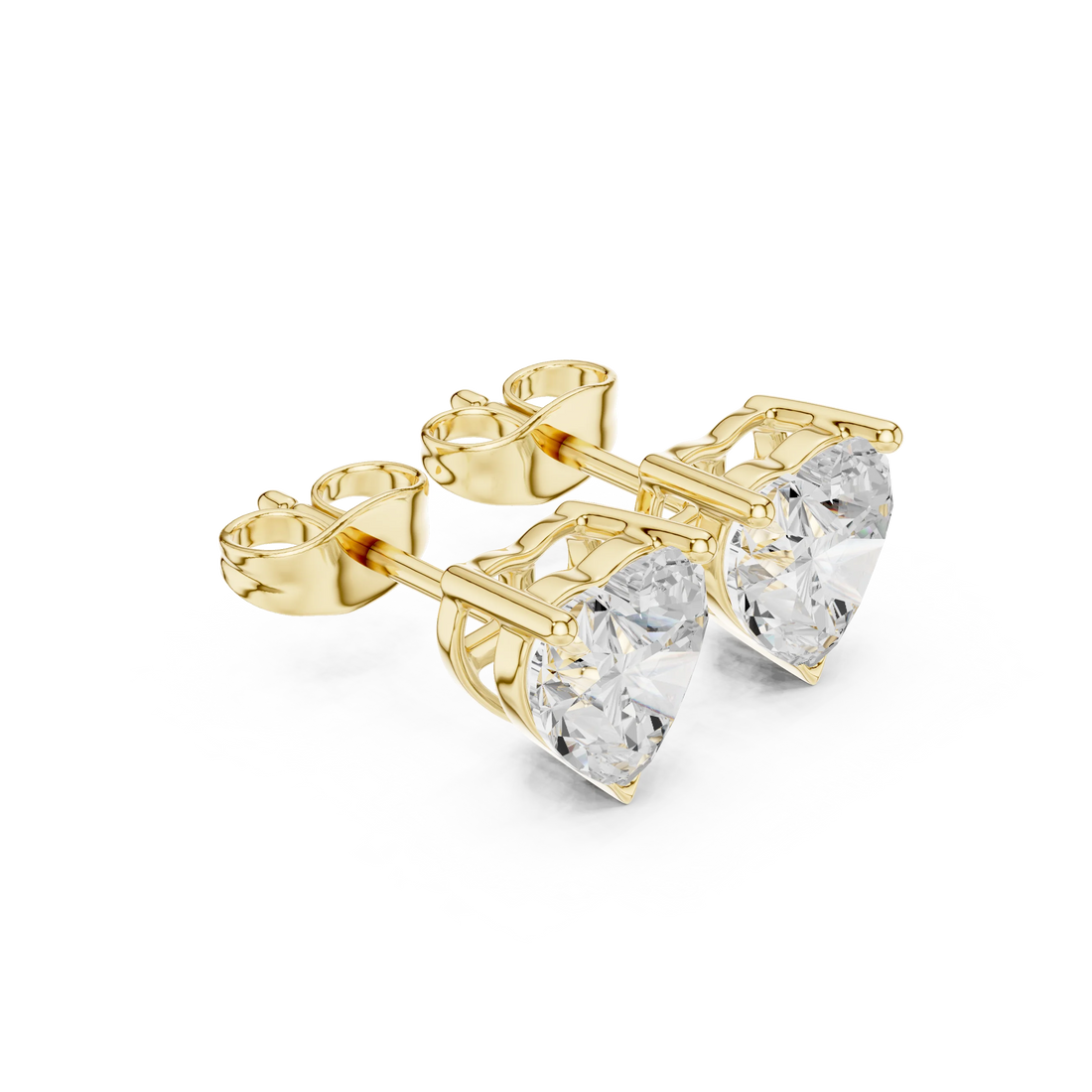 Gold heart-shaped stud earrings with clear gemstones on a white background with side view