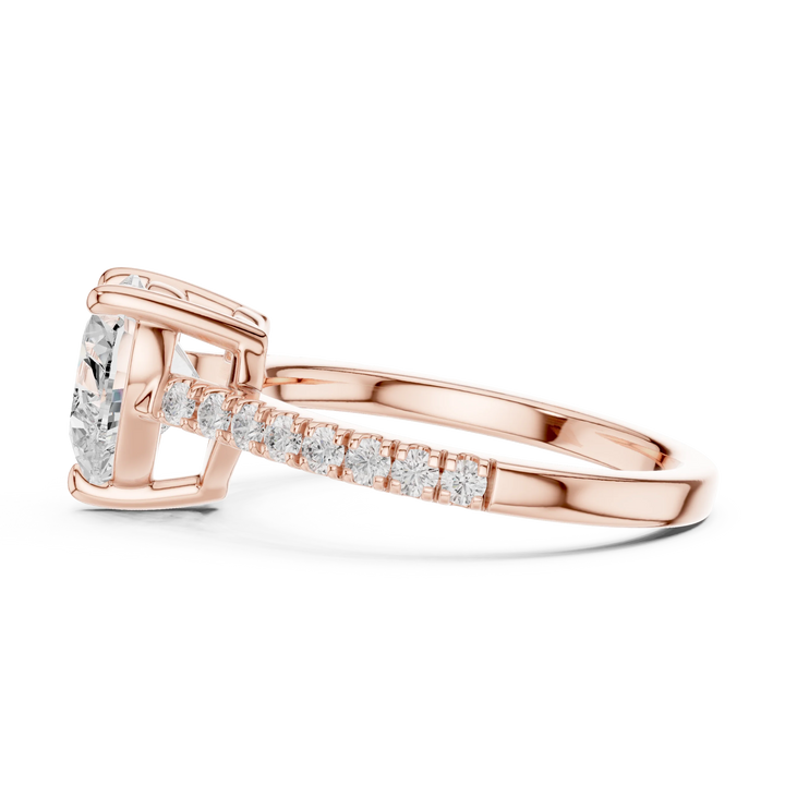Side profile of rose gold heart-shaped diamond pavé band ring with detailed band setting