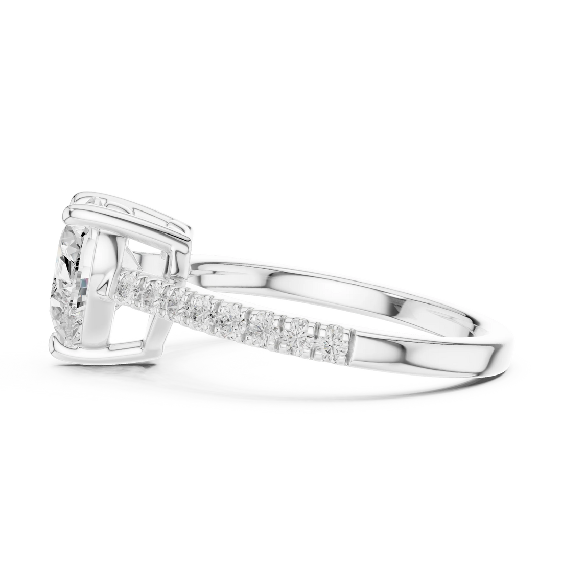 Side view of white gold heart-shaped diamond pavé band ring with detailed band setting