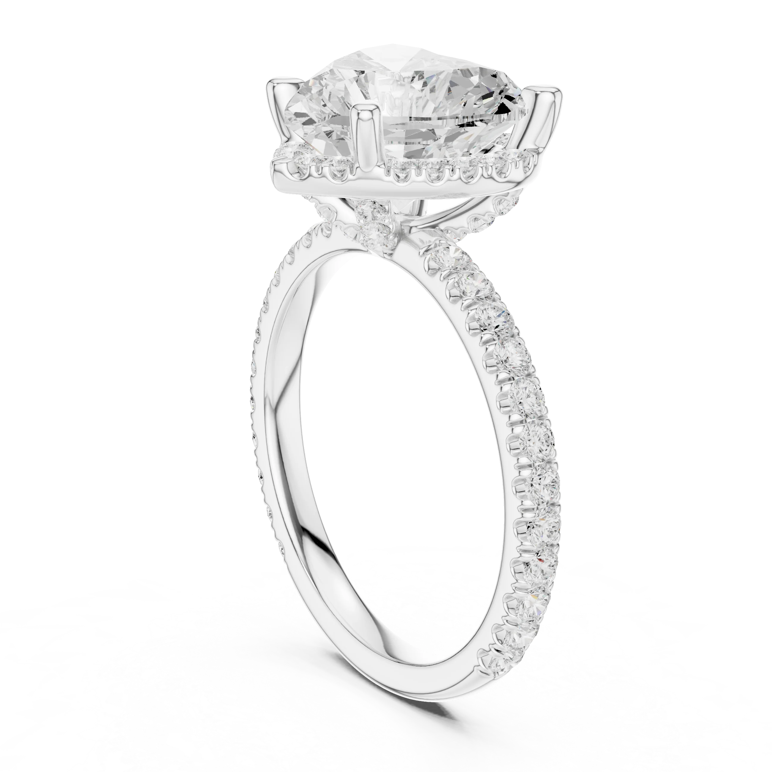 Back side view of white gold heart cut solitaire ring showing hidden halo and thin pavé band details