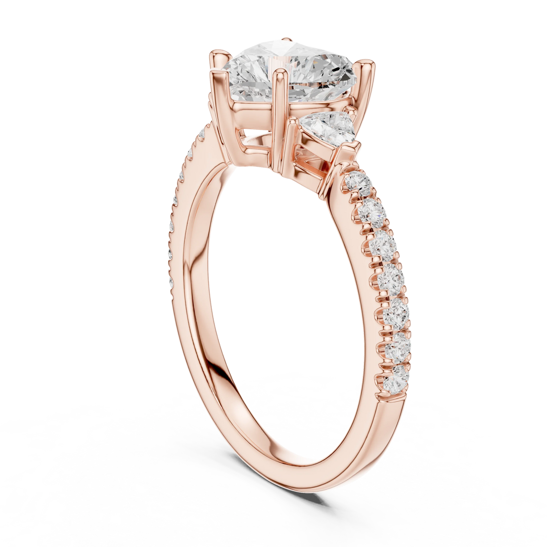 Back side view of rose gold heart shape three stone diamond pave ring, detailing band and setting.