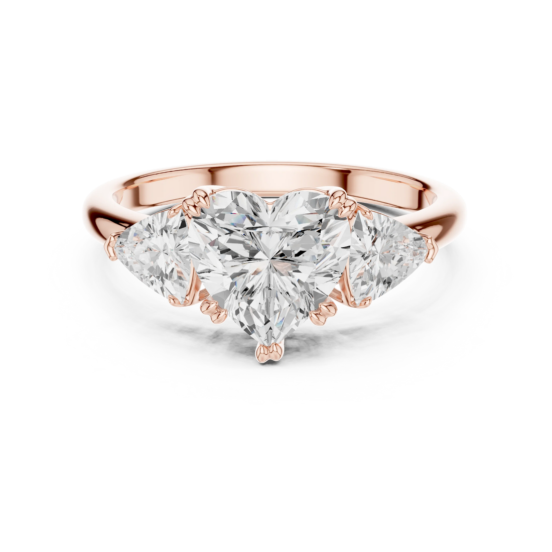 Heart three-stone ring in rose gold with trillion cut side stones and lab-grown diamond – Australia