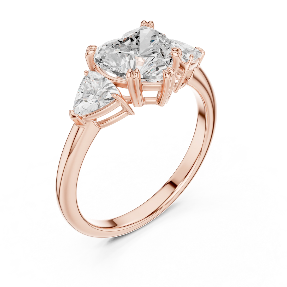Front view of rose gold heart three-stone ring with trillion cut side stones and lab-grown diamond – Australia