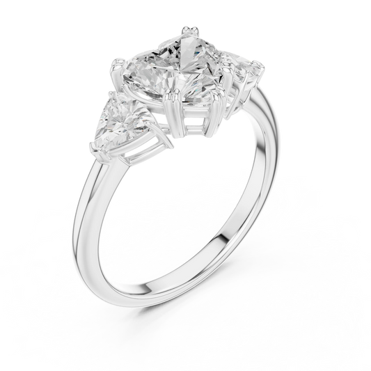 Front view of white gold heart three-stone ring with trillion cut side stones and lab-grown diamond – Australia