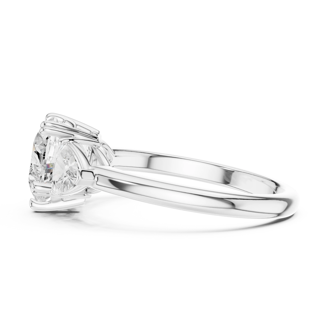 Side view of white gold heart three-stone ring with trillion cut side stones and lab-grown diamond – Australia