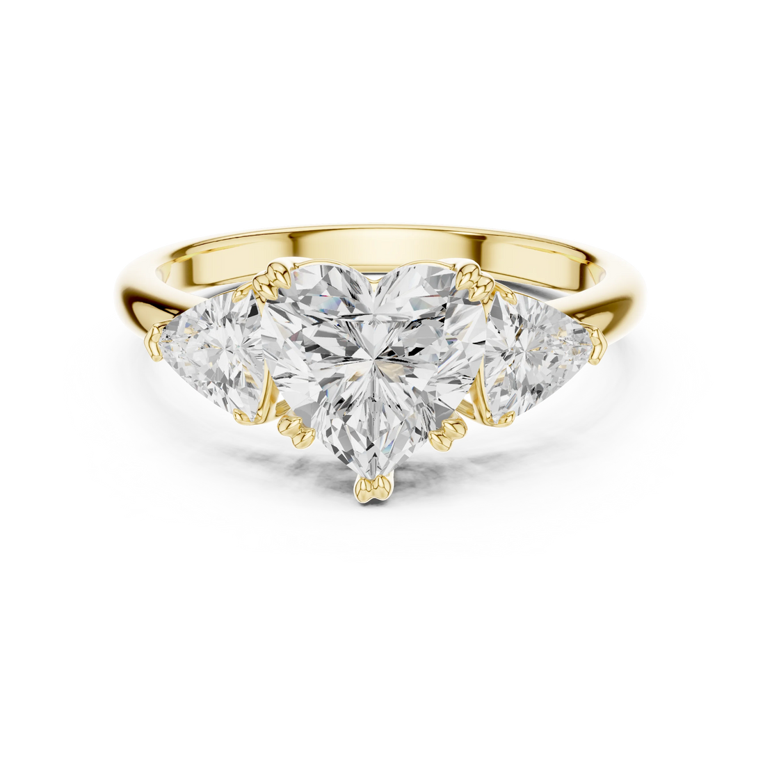 Heart three-stone ring in yellow gold with trillion cut side stones and lab-grown diamond – Australia