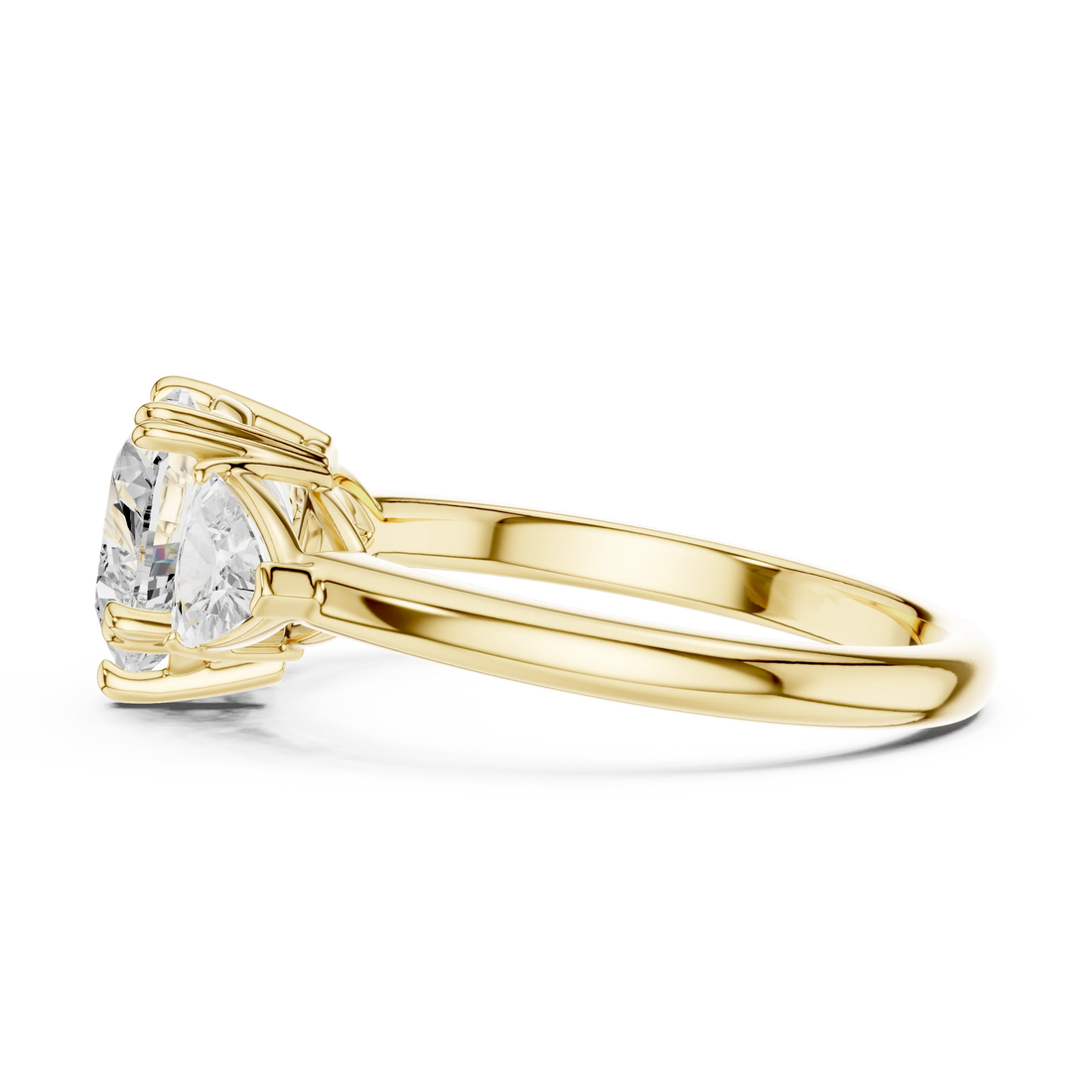 Side view of yellow gold heart three-stone ring with trillion cut side stones and lab-grown diamond – Australia