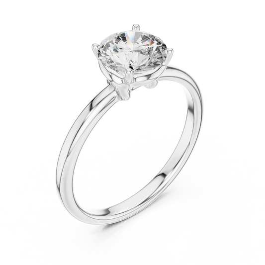 Top view of round cut diamond ring in white gold with round gemstone