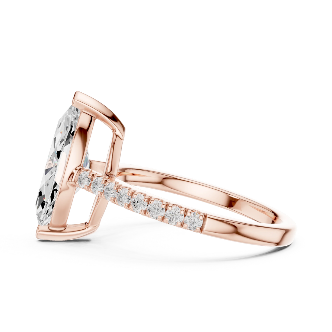 Side profile of rose gold marquise diamond pavé band ring with detailed band setting