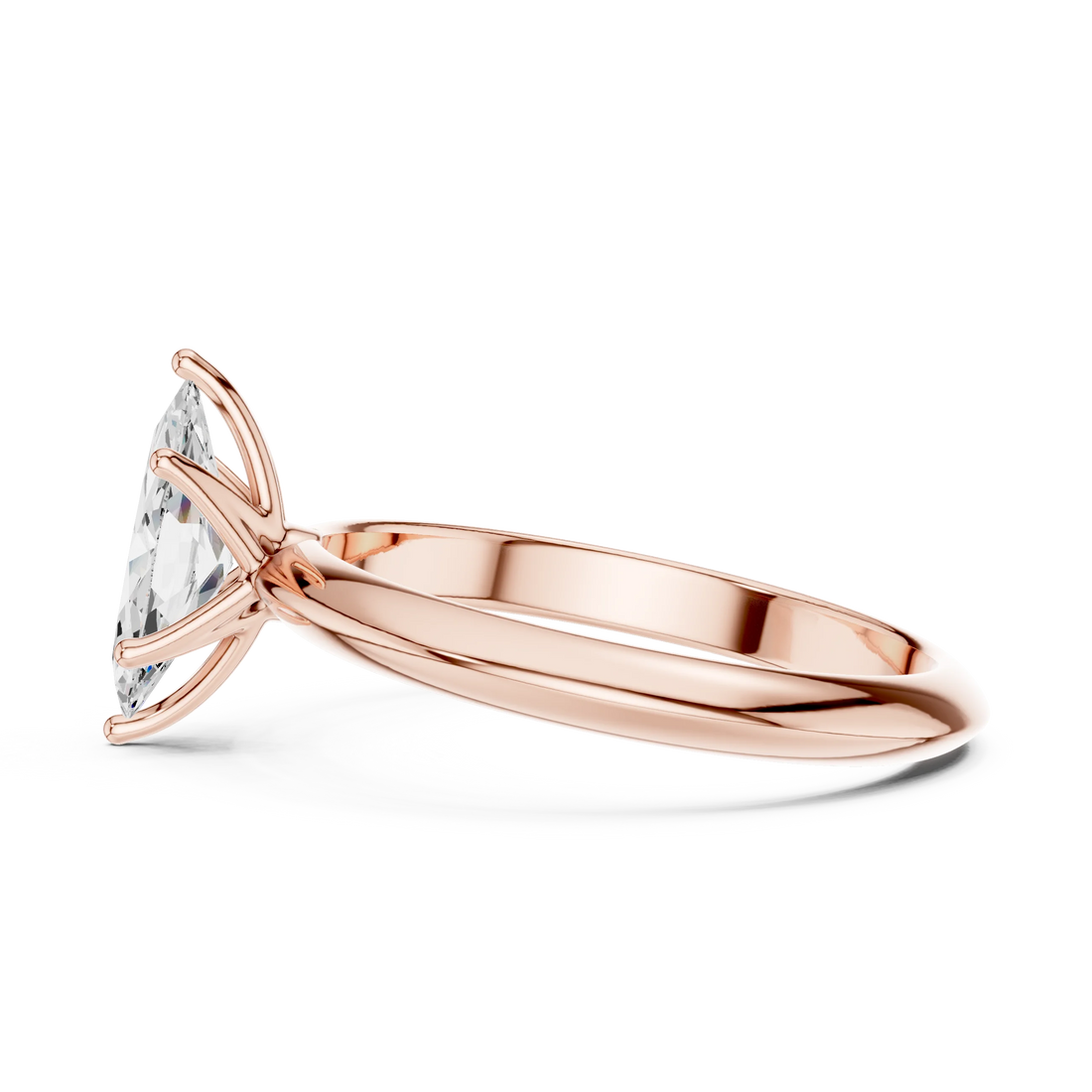Side view of rose gold marquise cut diamond solitaire ring, highlighting design profile.