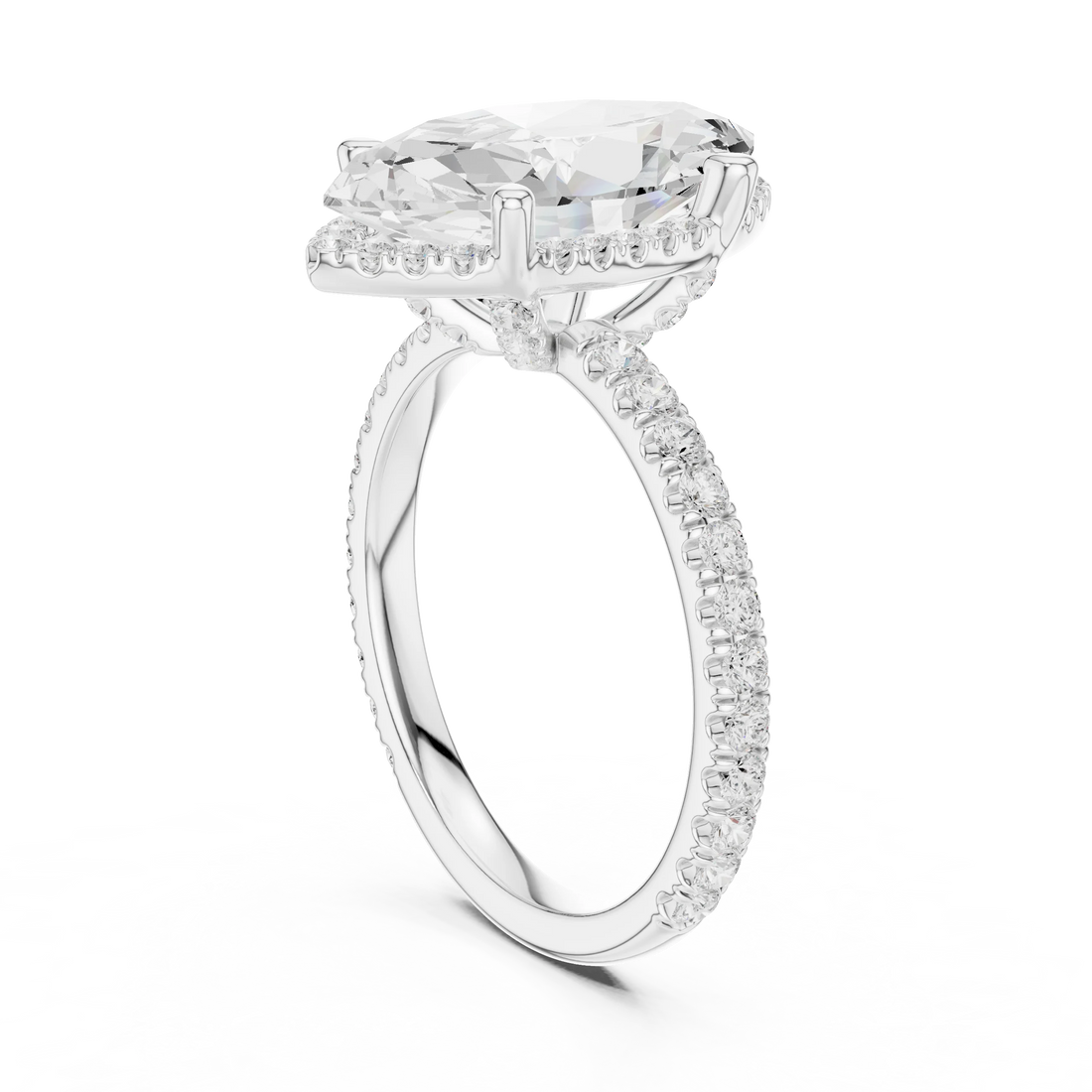 Back side view of white gold marquise cut solitaire ring showing hidden halo and thin pavé band details