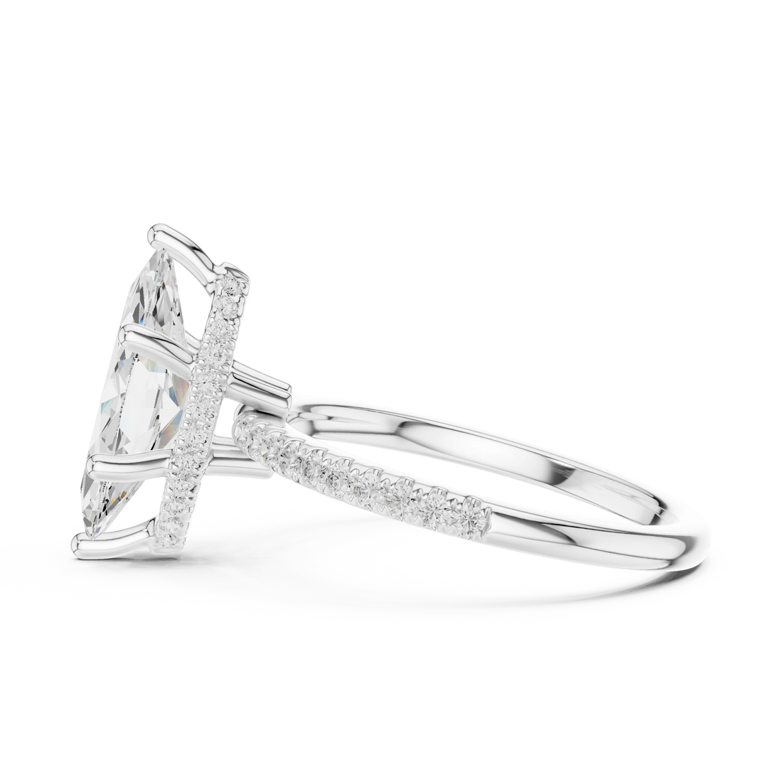 Side view of white gold marquise cut solitaire ring highlighting thin pave band and prong setting