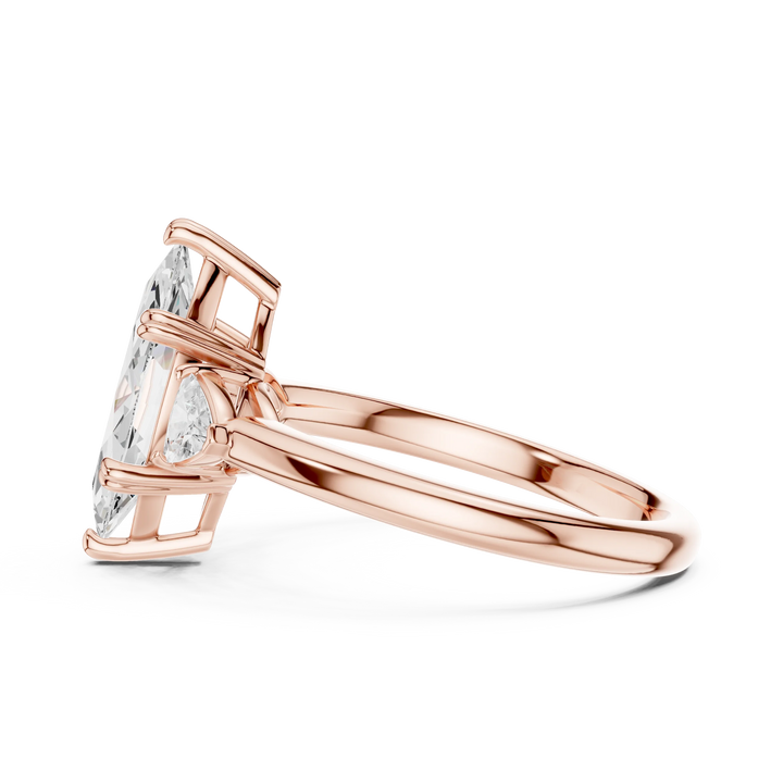 Side view of rose gold marquise three-stone ring with half-moon side stones and lab-grown diamond – Australi