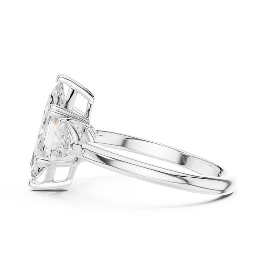 Side view of white gold marquise three-stone ring with trillion cut side stones and lab-grown diamond – Australia
