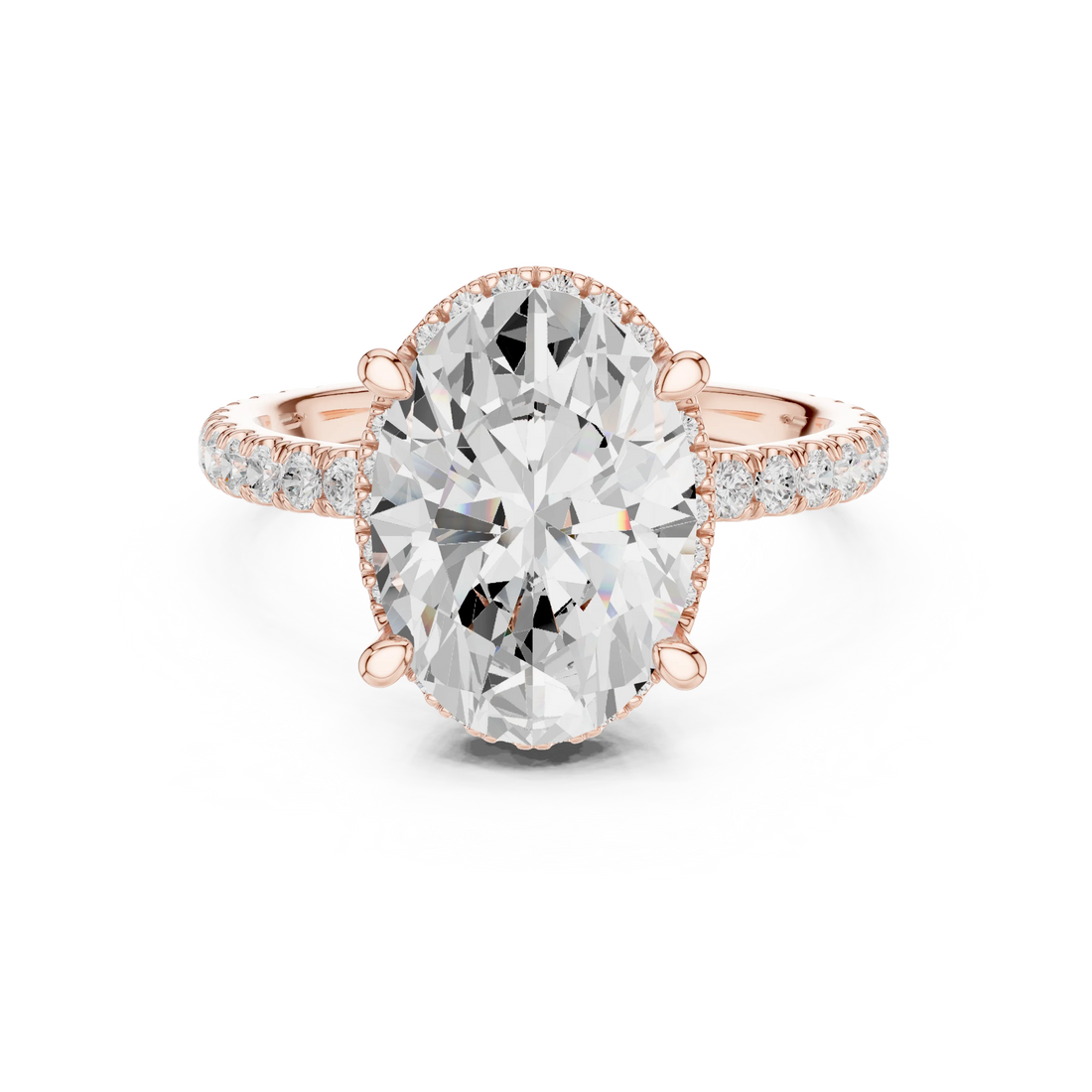 Rose gold oval cut solitaire ring with hidden halo and thin pavé band featuring lab-grown diamond, modern delicate look