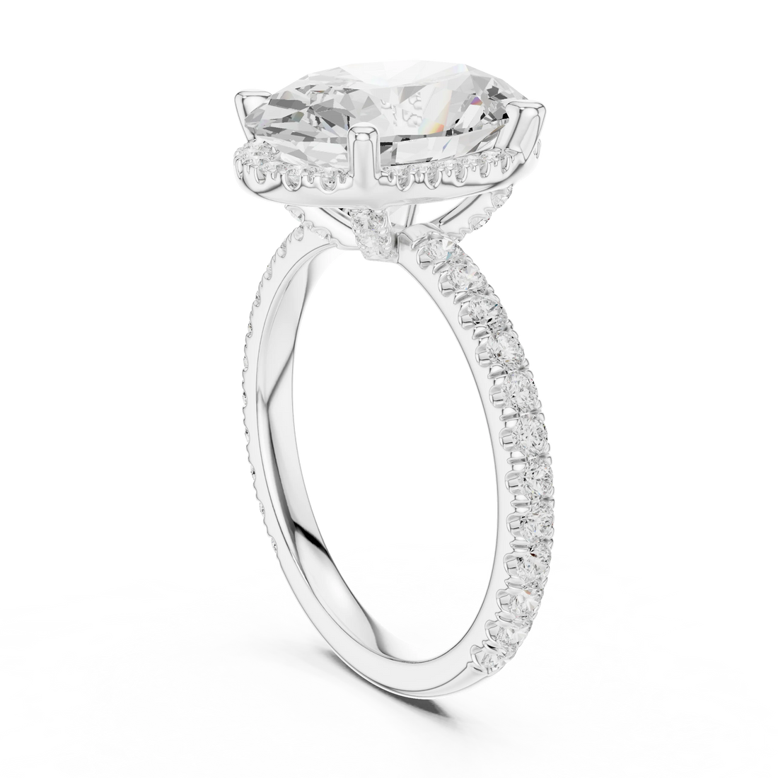 Back side view of white gold oval cut solitaire ring showing hidden halo and thin pavé band details