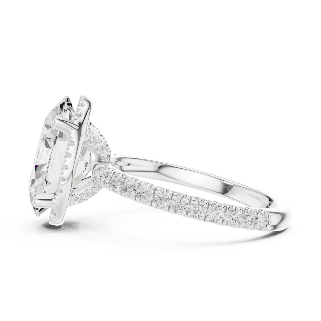 Side view of white gold oval cut solitaire ring highlighting hidden halo and thin pavé band design