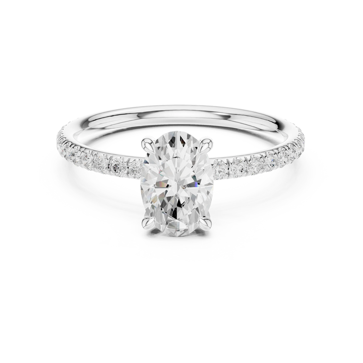 Lab-grown oval cut solitaire ring in white gold with thin pavé diamond band
