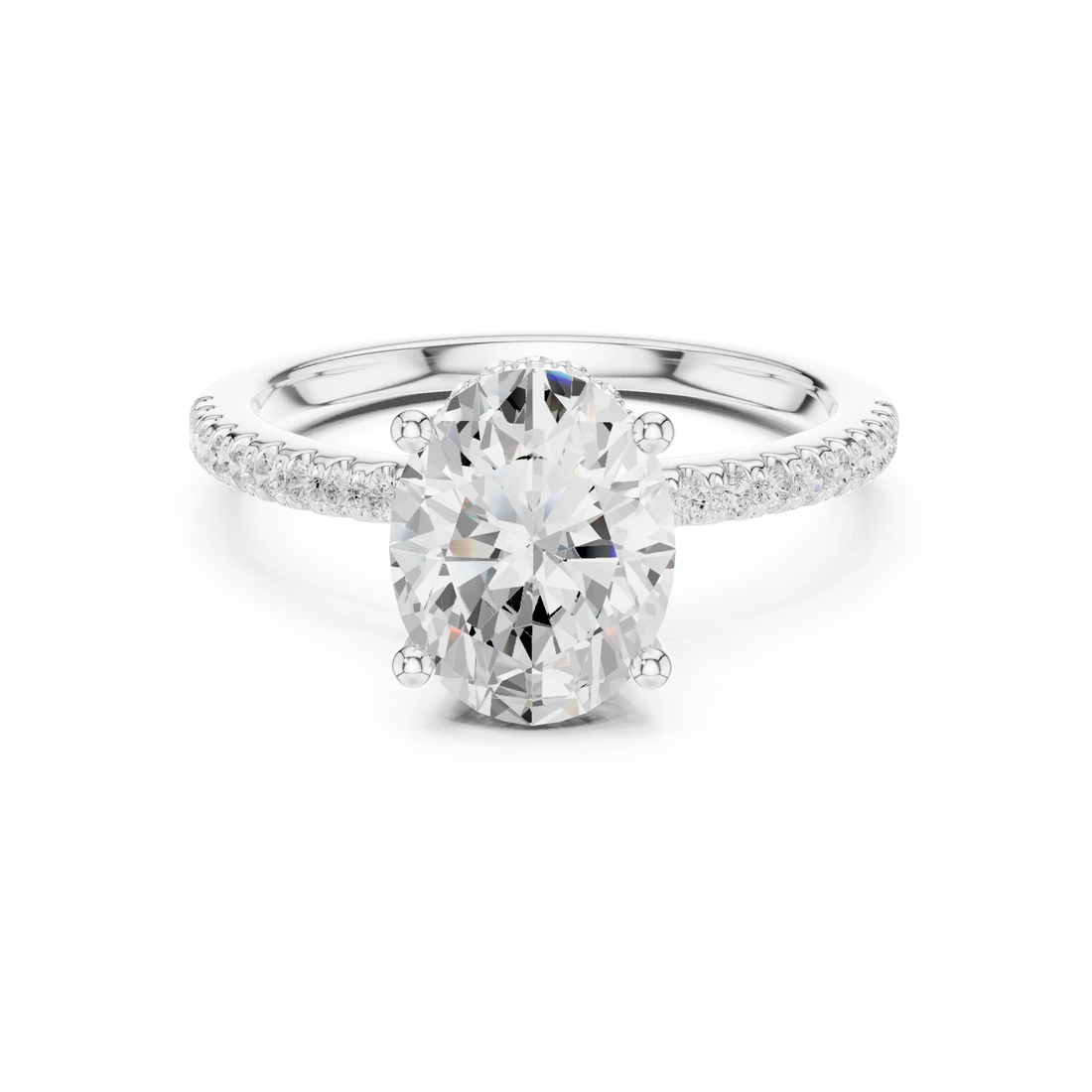 White gold oval cut solitaire ring with thin pave band and lab-grown diamond, delicate design
