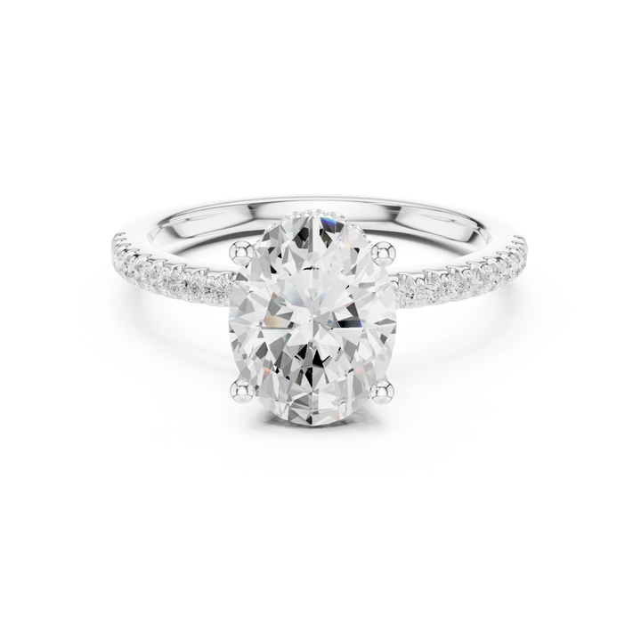 White gold oval cut solitaire ring with thin pave band and lab-grown diamond, delicate design