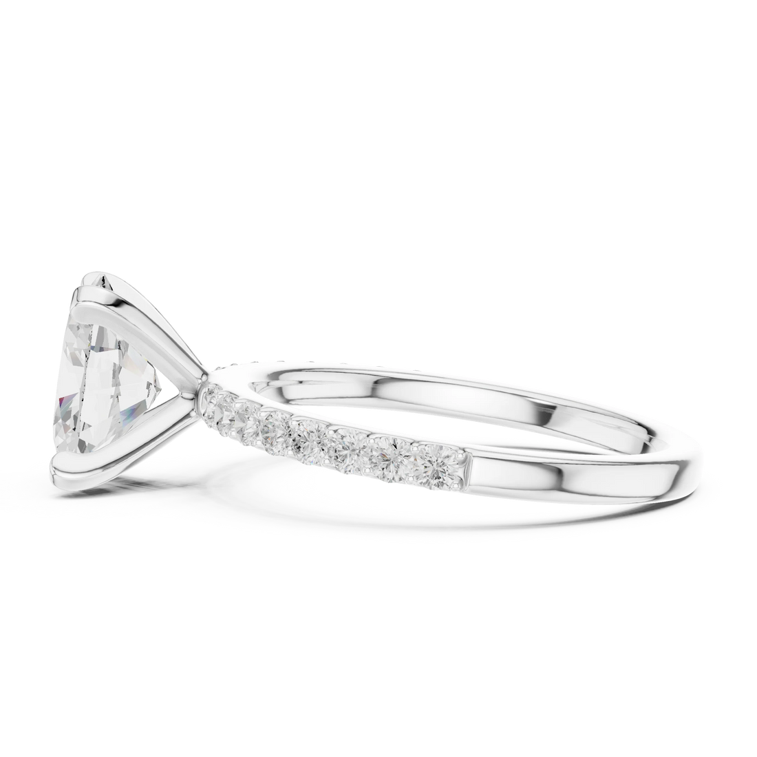 Side view of white gold oval solitaire ring with thin pavé band and elevated setting