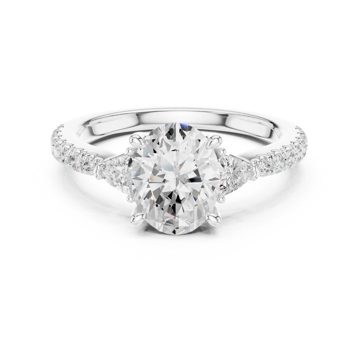 Lab-grown oval cut three stone diamond ring with half moon side stones and pave band in white gold, top view.