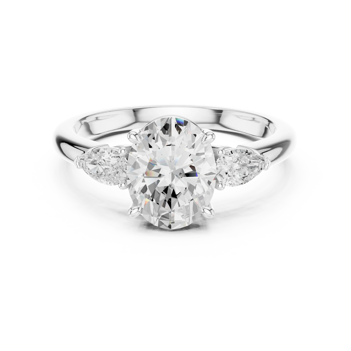 Oval three-stone ring in white gold with pear side stones and lab-grown diamond – Australia