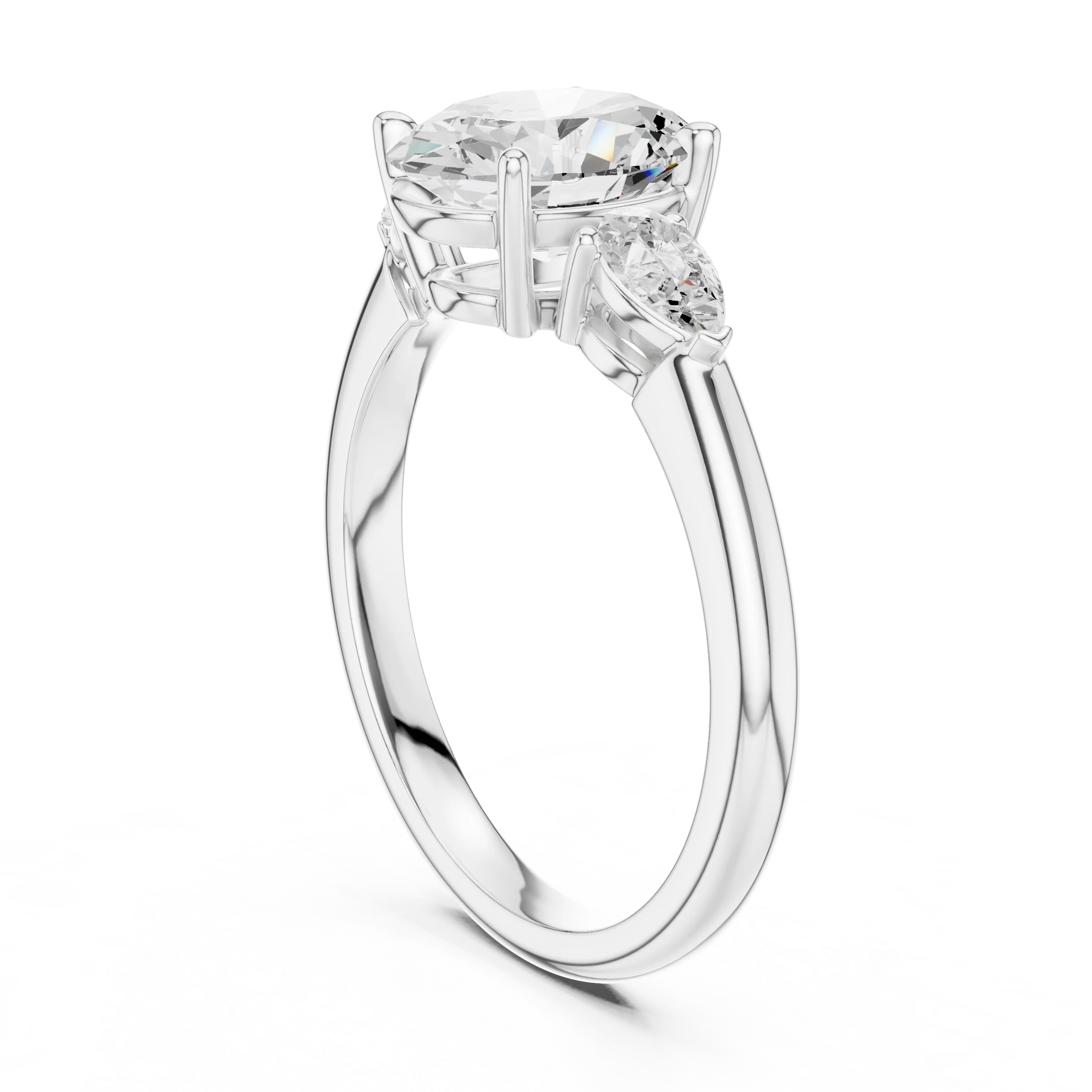 Back side view of white gold oval three-stone ring with pear side stones and lab-grown diamond – Australia