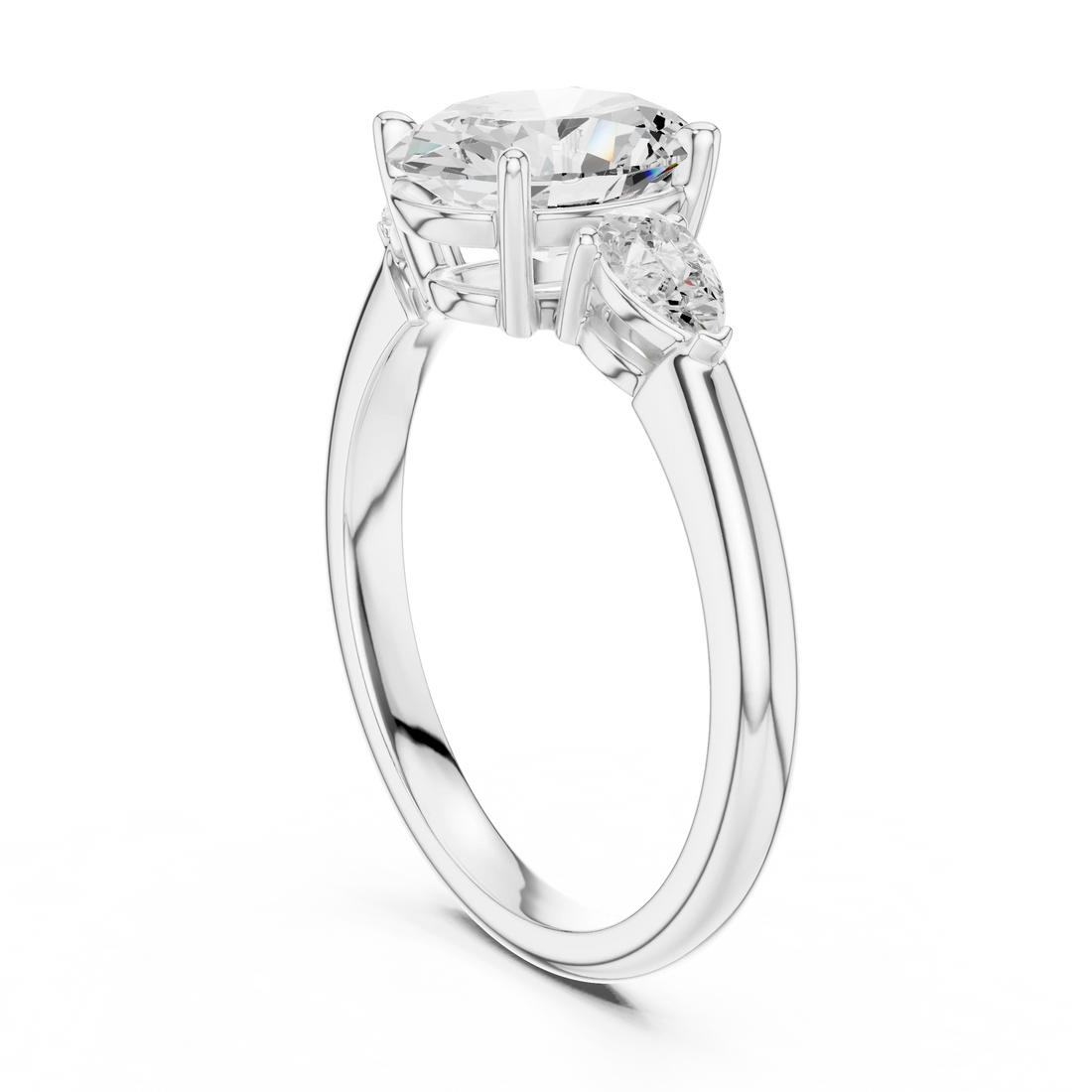 Back side view of white gold oval three-stone ring with pear side stones and lab-grown diamond – Australia