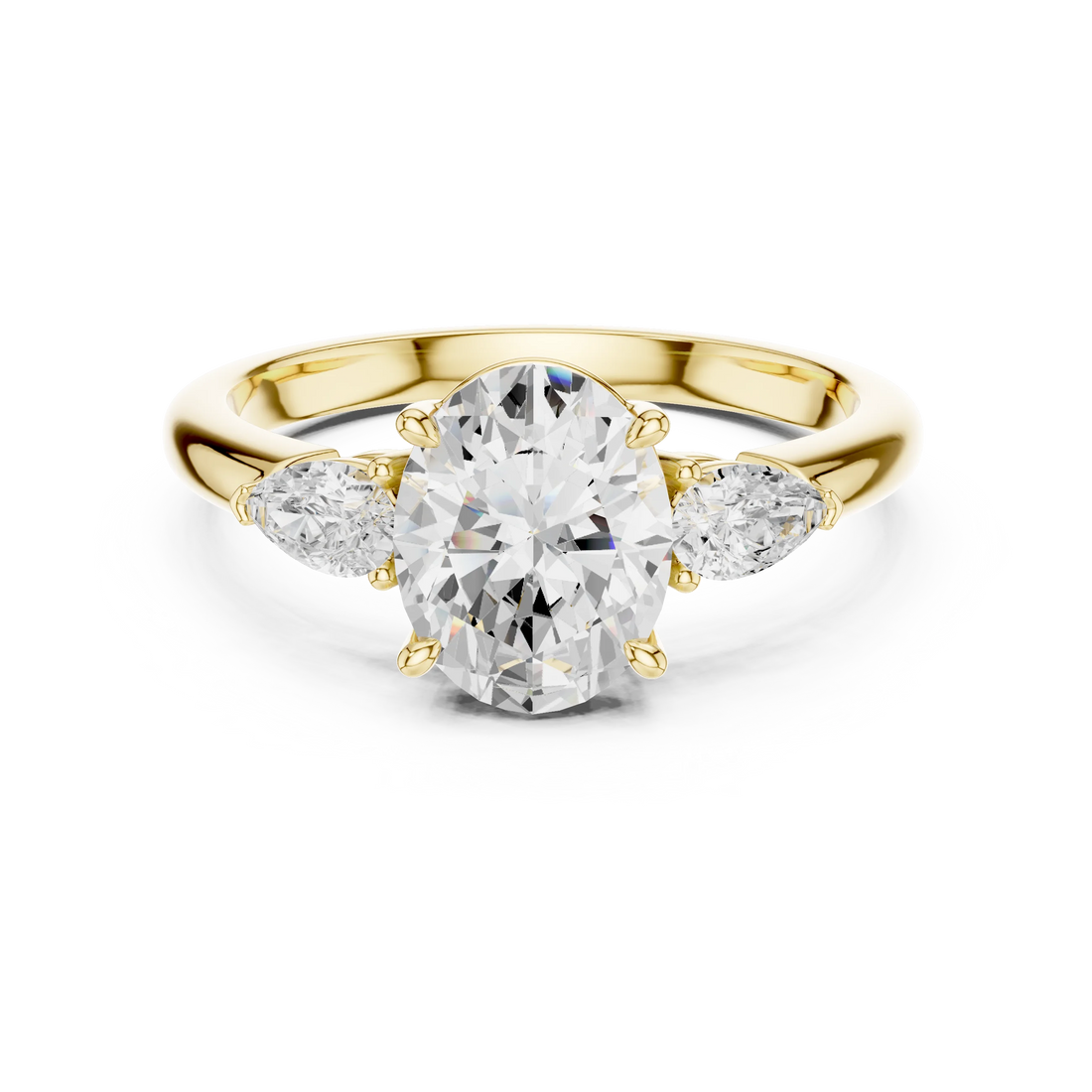 Oval three-stone ring in yellow gold with pear side stones and lab-grown diamond – Australia