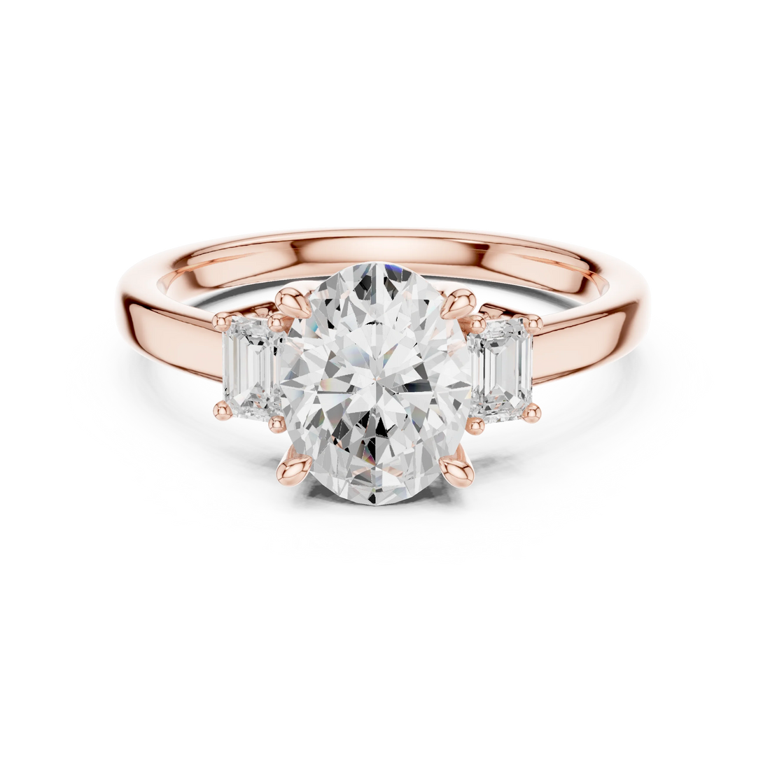 Lab-grown oval cut three stone diamond ring in rose gold, soft tone top view.