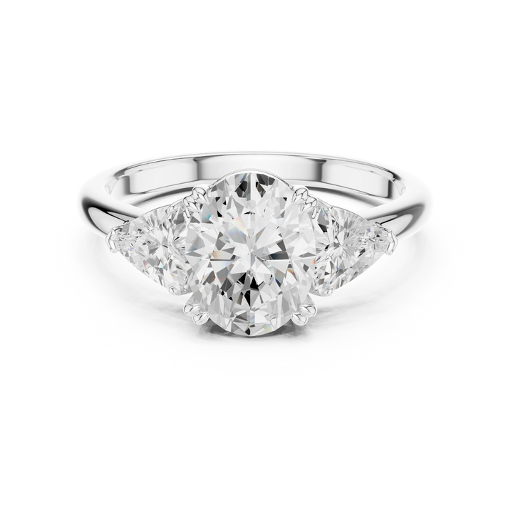 Oval three-stone ring in white gold with trillion cut side stones and lab-grown diamond – Australia