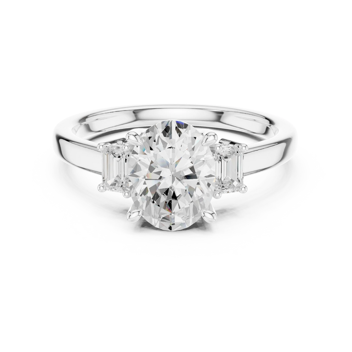 Lab-grown oval cut three stone diamond ring in white gold, elegant top view.