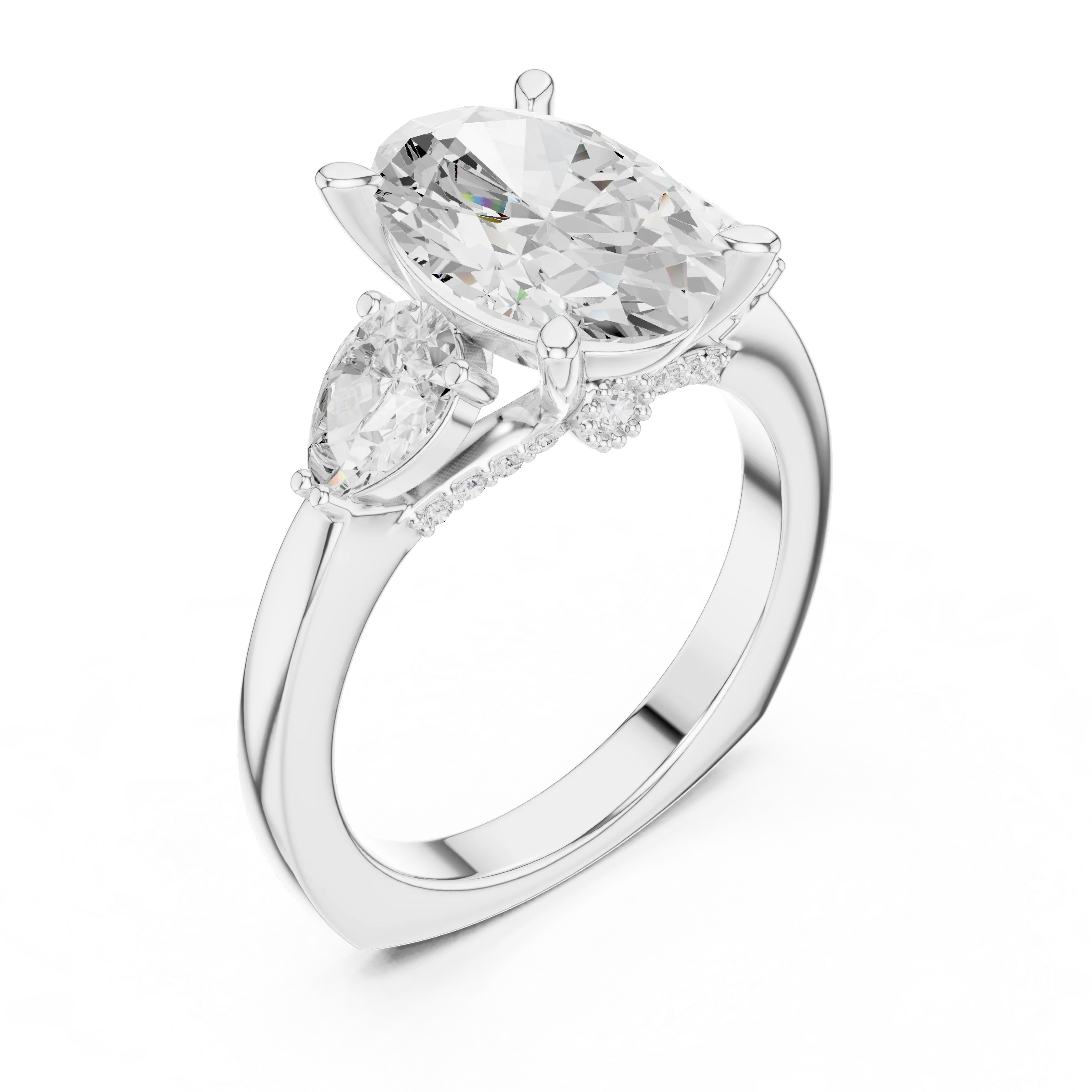 Front view of white gold oval three stone ring with pear side stones and lab-grown diamonds