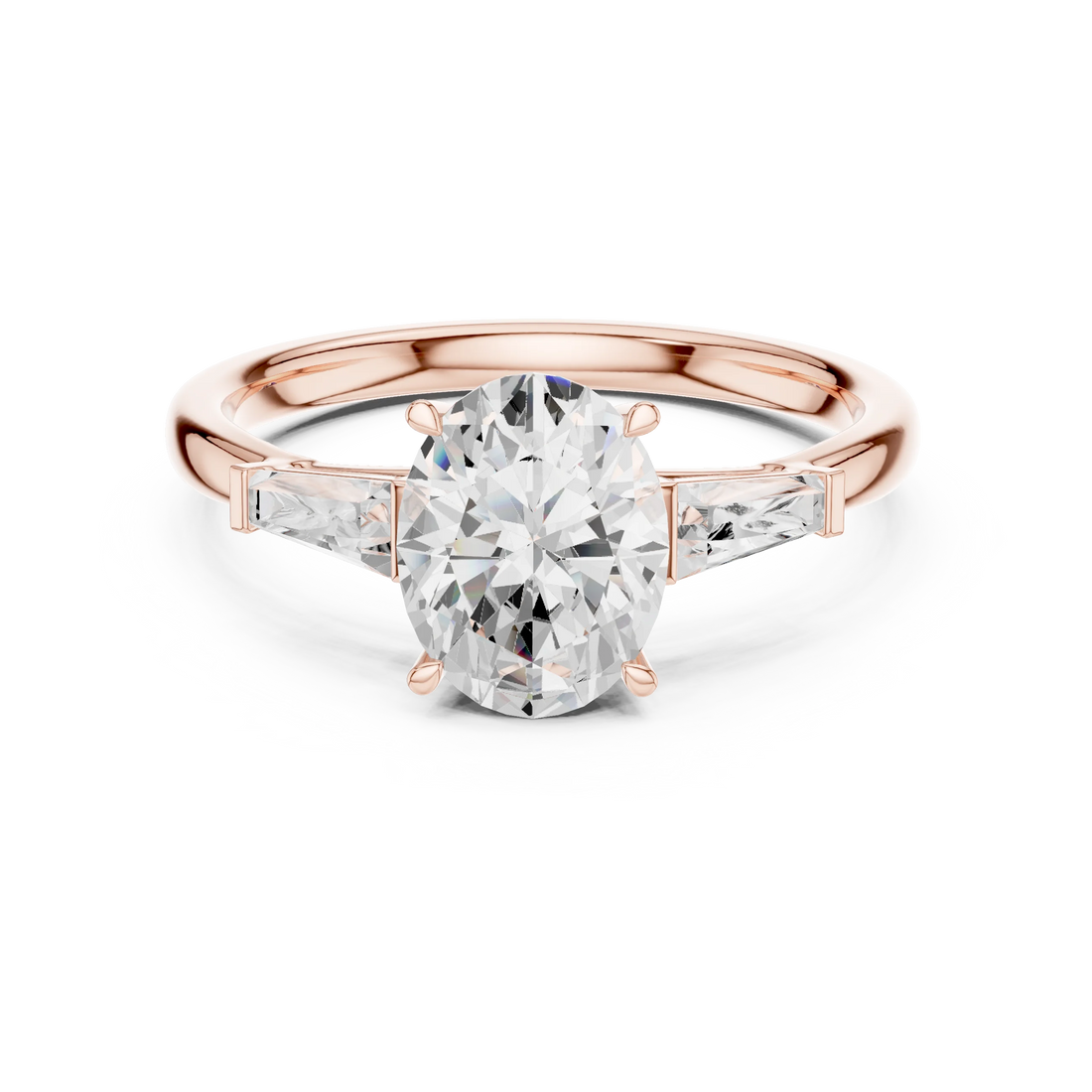 Oval three stone ring with tapered baguette side stones and lab-grown diamonds in rose gold with modern romantic finish