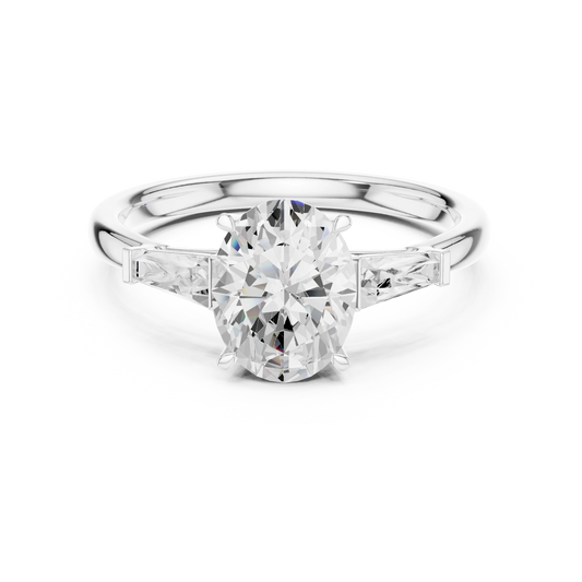 Oval three stone ring with tapered baguette side stones and lab-grown diamonds in white gold, elegant and timeless design, Australia collection