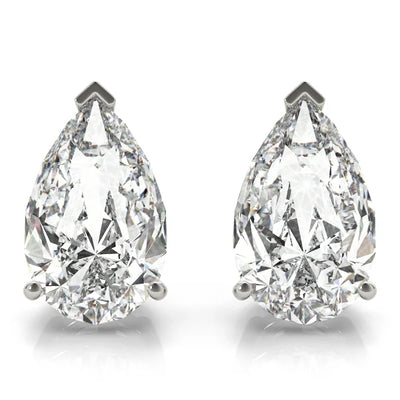 Pair of pear-shaped diamond earrings on a white background