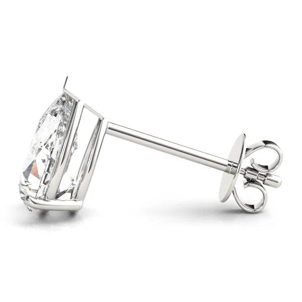 Single Diamond earring on a white background side view