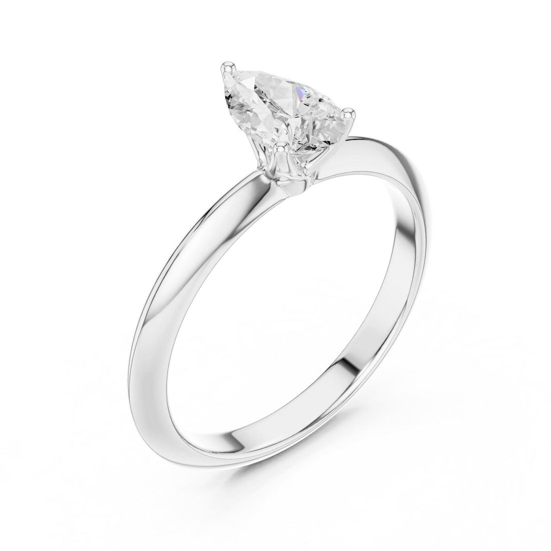Front view of white gold pear cut diamond solitaire ring, showcasing center stone.