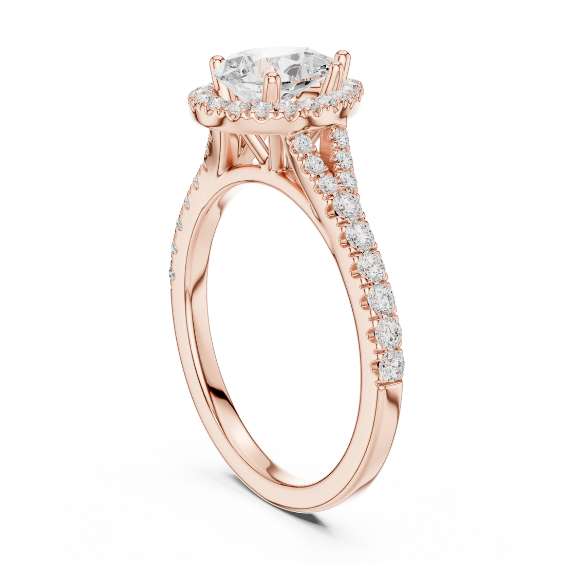 Back side view of rose gold pear halo ring showing pavé split shank band and setting details