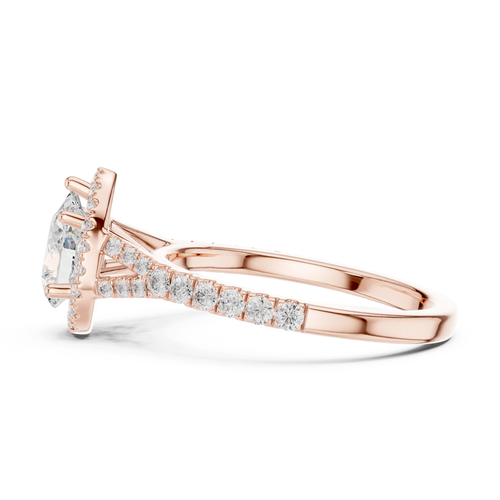 Side profile of rose gold pear halo ring with pavé split shank band and elevated halo setting