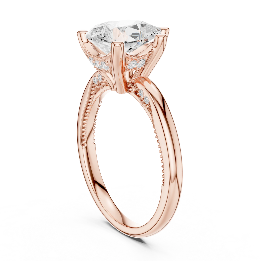 Back side view of rose gold pear cut solitaire ring showing hidden halo and domed band structure
