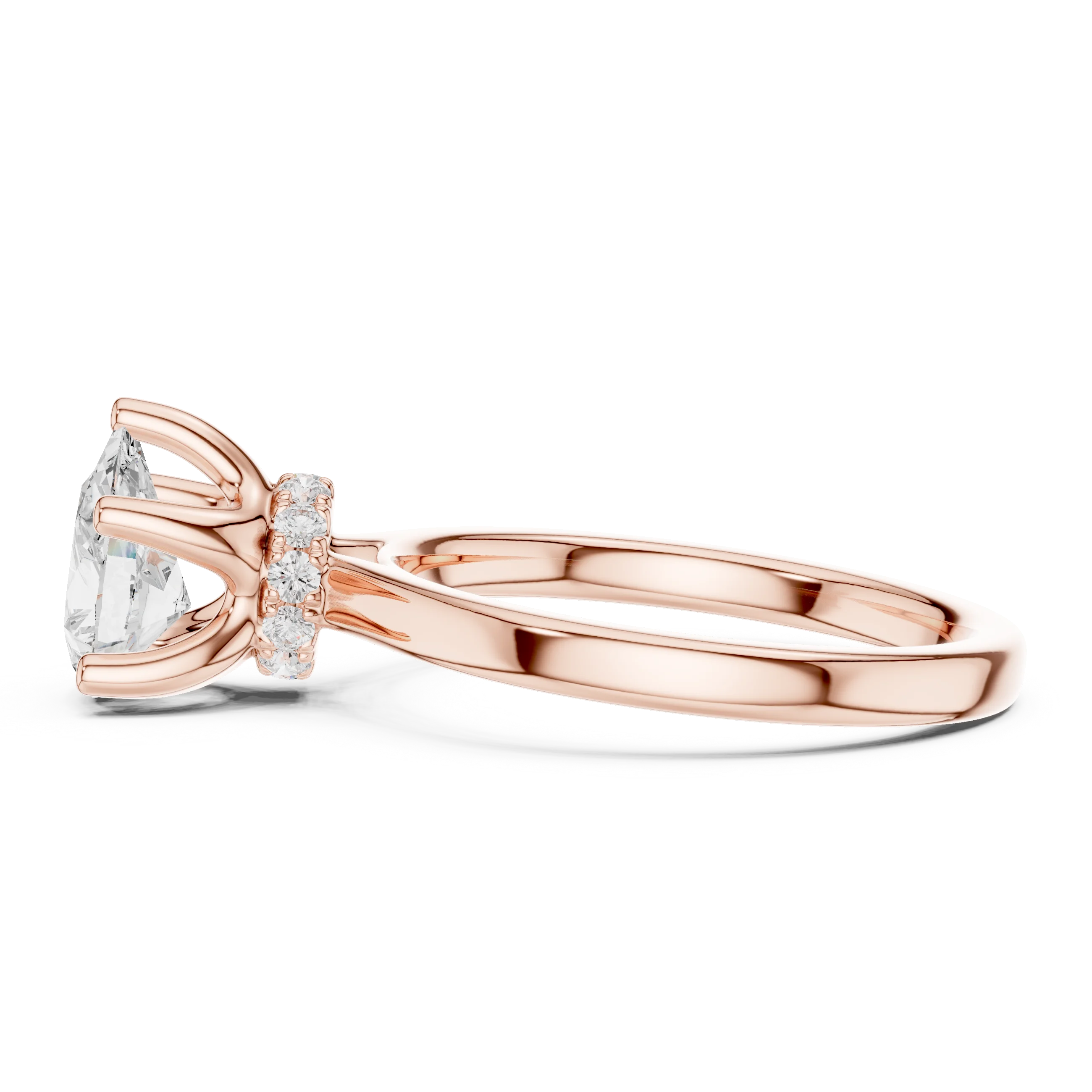Side view of rose gold pear cut solitaire ring highlighting hidden halo and domed band design