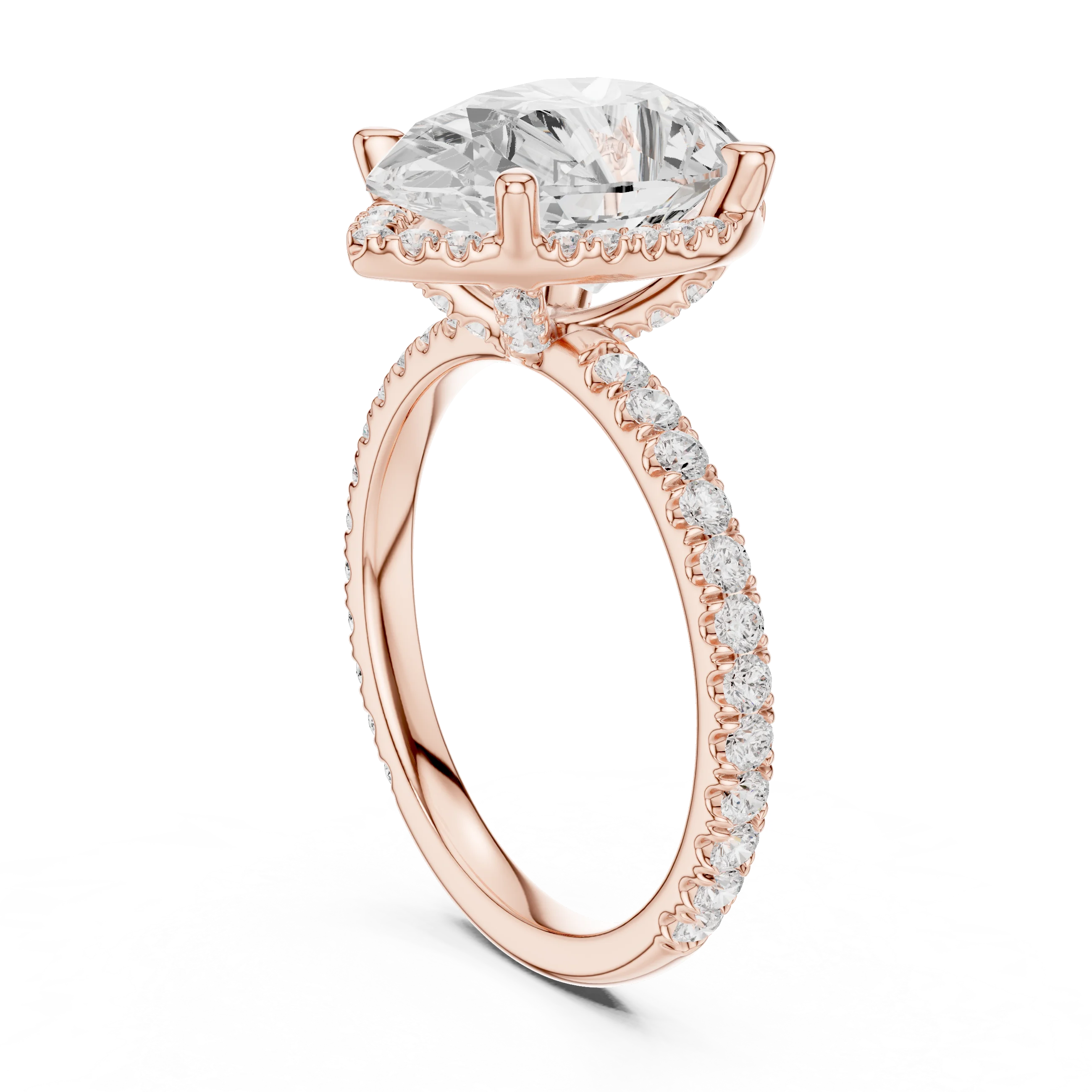 Back side view of rose gold pear cut solitaire ring showing hidden halo and thin pavé band structure