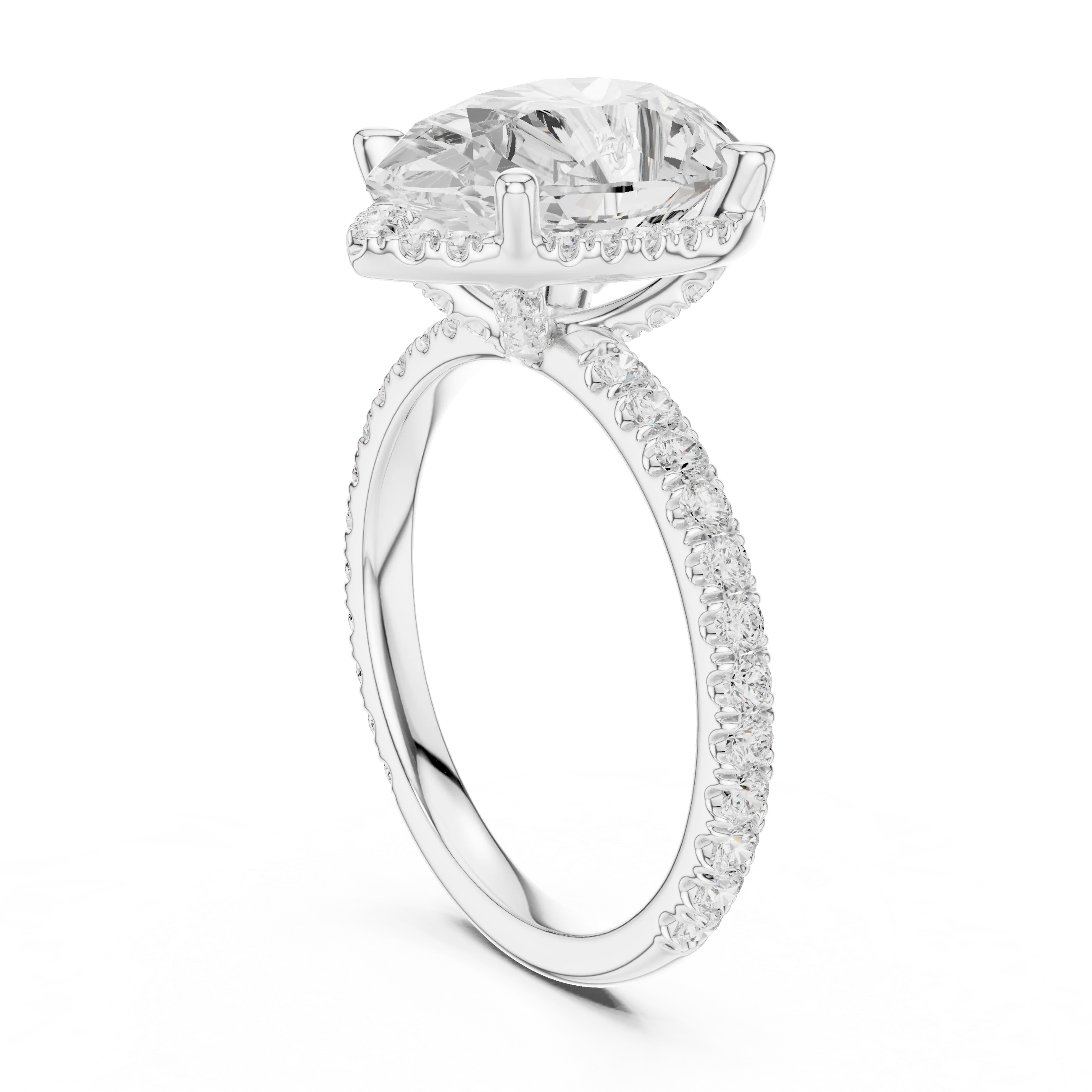 Back side view of white gold pear cut solitaire ring showing hidden halo and thin pavé band details