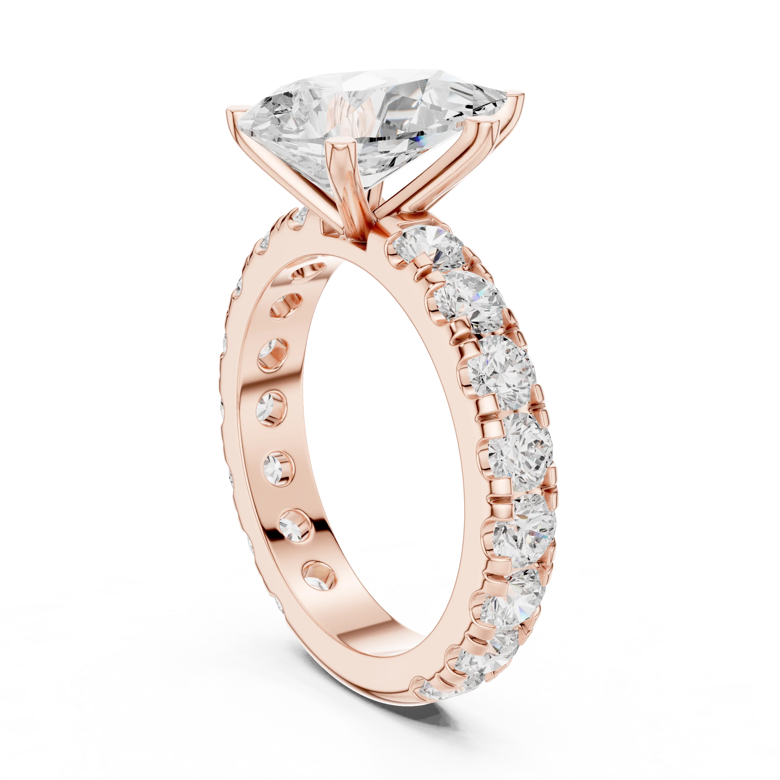Back side view of rose gold pear cut solitaire ring showing pave band and setting structure