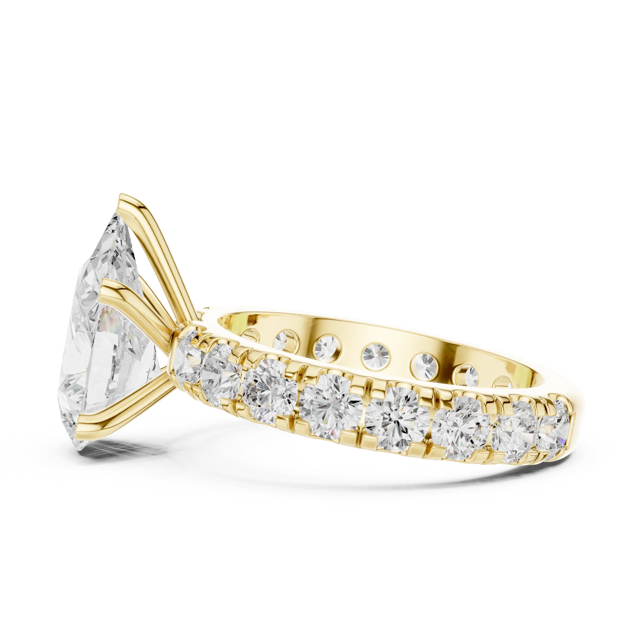 Side view of yellow gold pear cut solitaire ring highlighting pave band and stone settin