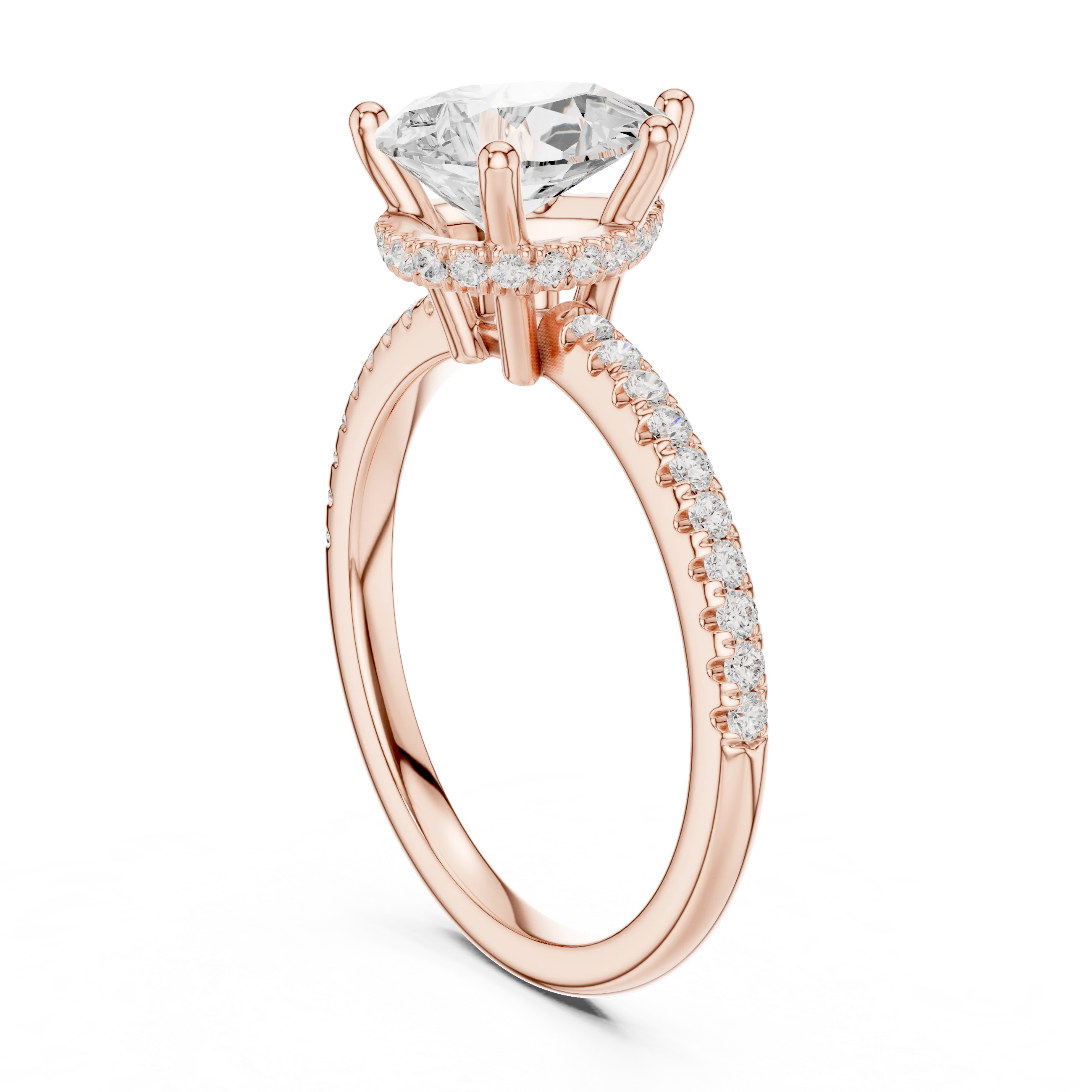 Back side view of rose gold pear cut solitaire ring showing thin pave band and setting structure