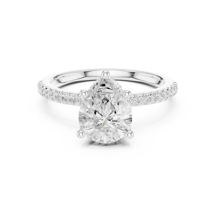 White gold pear cut solitaire ring with thin pave band and lab-grown diamond, delicate design