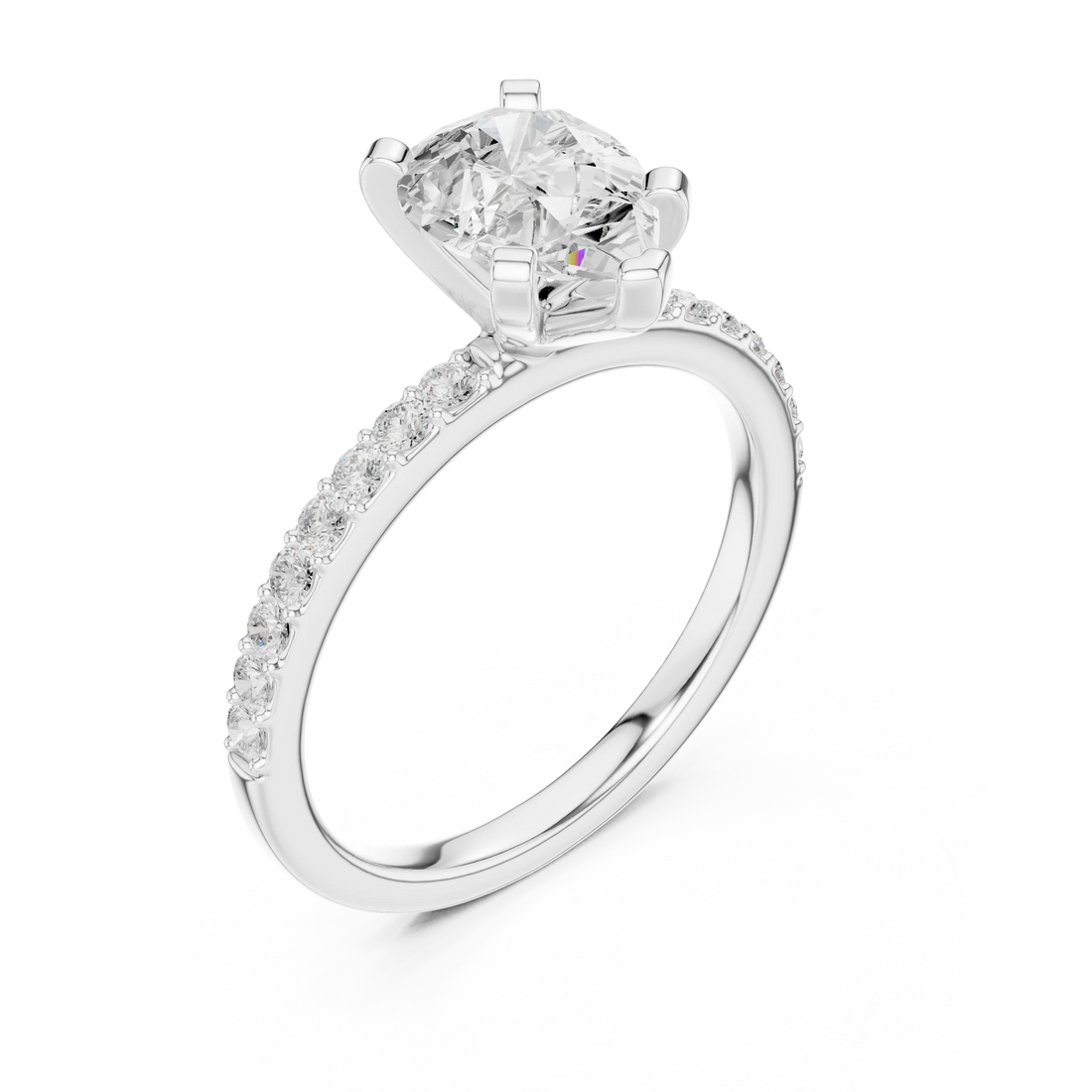Front view of white gold pear solitaire ring with thin pavé band and center diamond